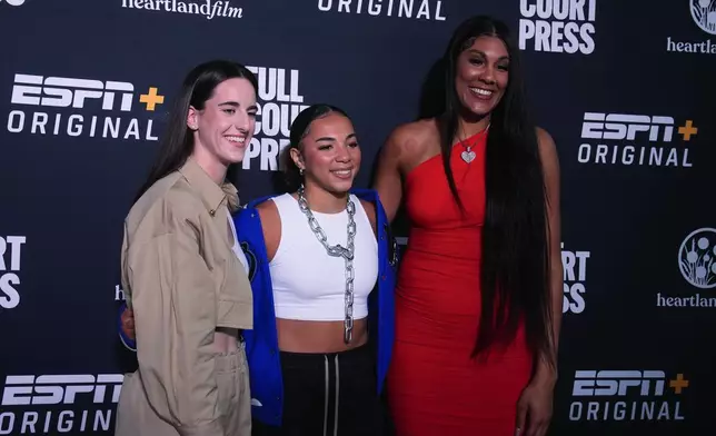 From left to right, Indiana Fever's Caitlin Clark, UCLA's Kiki Rice and Chicago Sky's Kamilla Cardoso arrive on the Red Carpet before the world premiere and screening of Episode 1 of the upcoming ESPN+ Original Series Full Court Press, Monday, May 6, 2024, in Indianapolis. (AP Photo/Darron Cummings)