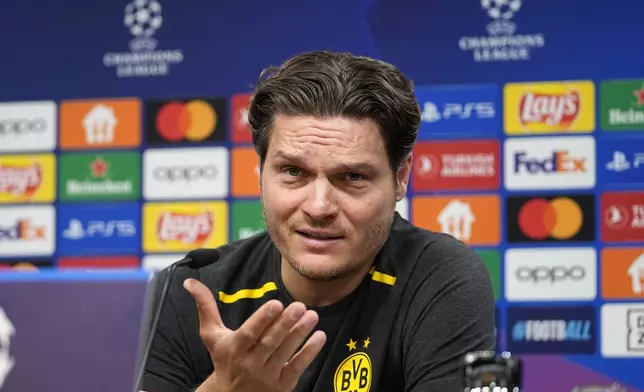 Dortmund's head coach Edin Terzic talks to the media at a press conference prior the Champions League semifinal first leg soccer match between Borussia Dortmund and Paris Saint-Germain at the Signal-Iduna Park in Dortmund, Germany, Tuesday, April 30, 2024. (AP Photo/Martin Meissner)