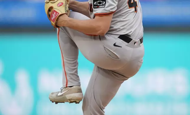 San Francisco Giants pitcher Mason Black winds up during the first inning of a baseball game against the Philadelphia Phillies, Monday, May 6, 2024, in Philadelphia. (AP Photo/Matt Rourke)