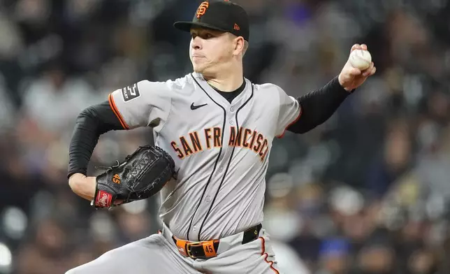 San Francisco Giants starting pitcher Kyle Harrison works against the Colorado Rockies in the seventh inning of a baseball game Tuesday, May 7, 2024, in Denver. (AP Photo/David Zalubowski)