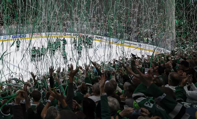 Streamers drop after the Dallas Stars defeated the Vegas Golden Knights 2-1 in Game 7 of an NHL hockey Stanley Cup first-round playoff series, Sunday, May 5, 2024, in Dallas. (AP Photo/Brandon Wade)