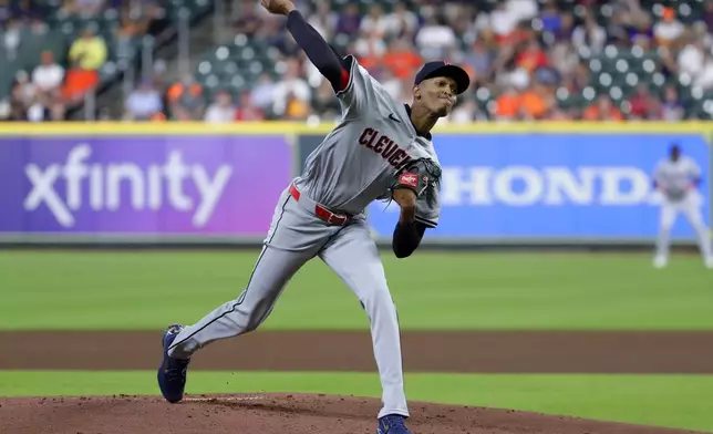 Cleveland Guardians starting pitcher Triston McKenzie throws against the Houston Astros during the first inning of a baseball game Wednesday, May 1, 2024, in Houston. (AP Photo/Michael Wyke)