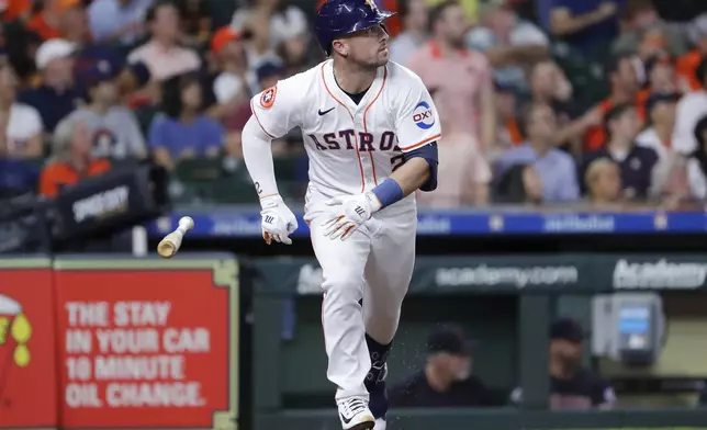 Houston Astros' Alex Bregman flips his bat as he watches his three run home run against the Cleveland Guardians during the third inning of a baseball game Tuesday, April 30, 2024, in Houston. (AP Photo/Michael Wyke)