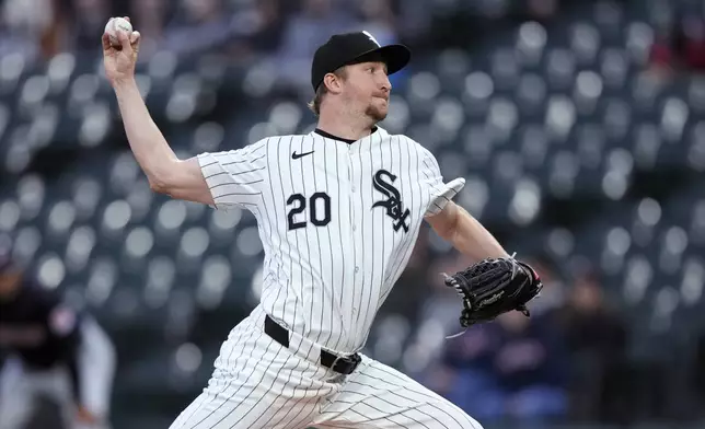 Chicago White Sox starting pitcher Erick Fedde delivers to a Cleveland Guardians batter during the first inning of a baseball game Thursday, May 9, 2024, in Chicago. (AP Photo/Charles Rex Arbogast)
