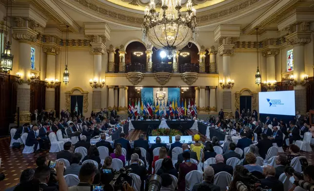 Regional leaders and representatives hold a meeting on irregular migration at the National Palace in Guatemala City, Tuesday, May 7, 2024. (AP Photo/Moises Castillo)