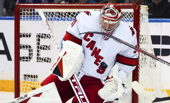 Carolina Hurricanes goaltender Frederik Andersen makes a save against the New York Rangers during the first period in Game 1 of an NHL hockey Stanley Cup second-round playoff series, Sunday, May 5, 2024, in New York. (AP Photo/Julia Nikhinson)