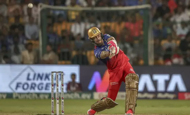 Royal Challengers Bengaluru's captain Faf du Plessis plays a shot during the Indian Premier League cricket match between Royal Challengers Bengaluru and Gujarat Titans in Bengaluru, India, Saturday, May 4, 2024. (AP Photo)