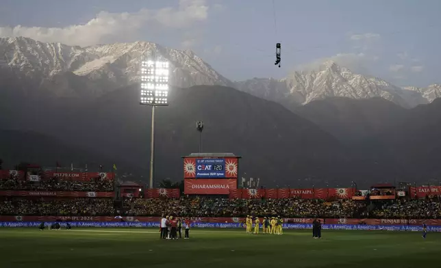 Chennai Super Kings' players chat during the strategic timeout of the Indian Premier League cricket match between Chennai Super Kings and Punjab Kings in Dharamshala, India, Sunday, May 5, 2024. (AP Photo /Ashwini Bhatia)