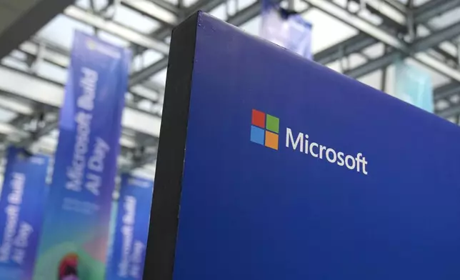 A logo of Microsoft is displayed during an event titled "Microsoft Build: AI Day" in Jakarta, Indonesia, Tuesday, April 30, 2024. Microsoft will invest $1.7 billion over the next four years in new cloud and artificial intelligence infrastructure in Indonesia — the single largest investment in Microsoft's 29-year history in the country, Microsoft CEO Satya Nadella said Tuesday. (AP Photo/Dita Alangkara)
