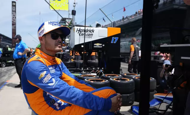 Kyle Larson waits in his pit box during a practice session for the Indianapolis 500 auto race at Indianapolis Motor Speedway, Monday, May 20, 2024, in Indianapolis. (AP Photo/Darron Cummings)