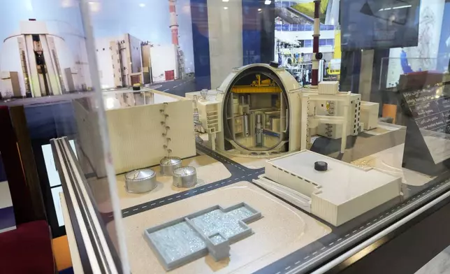 A model of Bushehr nuclear power plant is on display in an exhibition of the Iran's nuclear achievements during the "International Conference on Nuclear Science and Technology" in the central city of Isfahan, Iran, Monday, May 6, 2024. (AP Photo/Vahid Salemi)