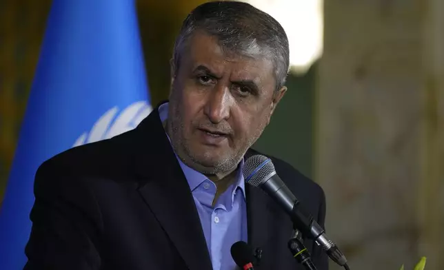 Head of Iran's atomic energy department Mohammad Eslami speaks during his joint press conference with International Atomic Energy Organization, IAEA, Director General Rafael Grossi after their meeting in the central city of Isfahan, Iran, Tuesday, May 7, 2024. (AP Photo/Vahid Salemi)
