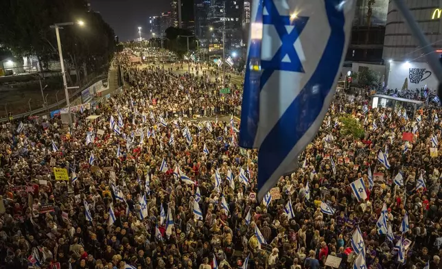 People protest against Israeli Prime Minister Benjamin Netanyahu's government and call for the release of hostages held in the Gaza Strip by the Hamas militant group in Tel Aviv, Israel, Saturday, May 4, 2024. (AP Photo/Ariel Schalit)