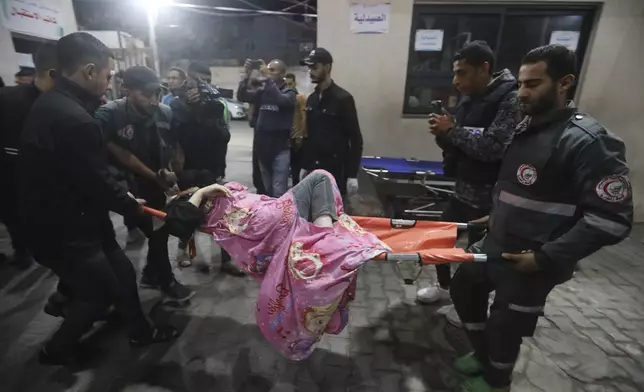 A Palestinian wounded in the Israeli bombardment of the Gaza Strip is brought to a hospital in Rafah, southern Gaza Strip, Tuesday, May 7, 2024. (AP Photo/Ismael Abu Dayyah)