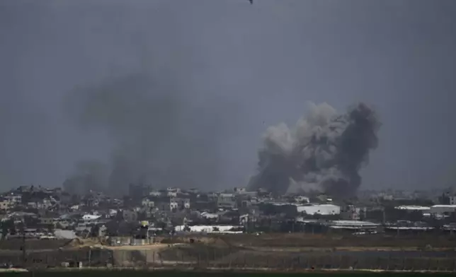 Smoke rises following an Israeli airstrike in the Gaza Strip, as seen from southern Israel, Thursday, May 16, 2024. (AP Photo/Leo Correa)