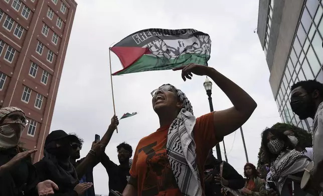 Pro-Palestinian supporters gather outside Harris County Jail after two people were arrested following a pro-Palestinian encampment on University of Houston campus on Wednesday, May 8, 2024, in Houston. (Elizabeth Conley/Houston Chronicle via AP)
