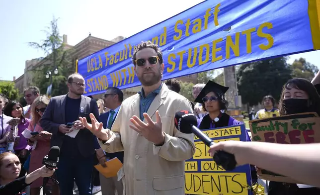 UCLA professor Nick Shapiro speaks at a news conference on the UCLA campus, after nighttime clashes between Pro-Israel and Pro-Palestinian groups, Wednesday, May 1, 2024, in Los Angeles. (AP Photo/Jae C. Hong)