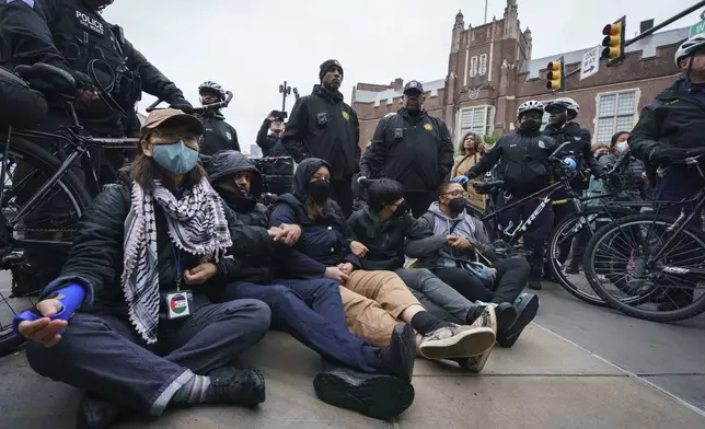 Police arrive to remove protesters on the University of Pennsylvania campus, in Philadelphia, on Friday, May 10, 2024. (Jessica Griffin/The Philadelphia Inquirer via AP)