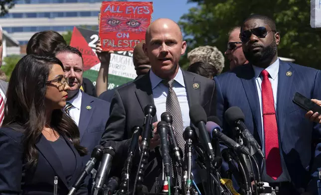 Rep. William Timmons, R-S.C., accompanied other members of Congress speaks to the media after they toured the George Washington University students encampment as they protest over the Israel-Hamas war on Wednesday, May 1, 2024, in Washington. (AP Photo/Jose Luis Magana)