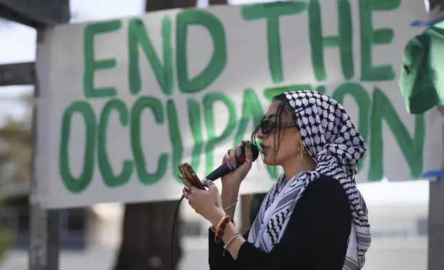 A student speaks during a Students for Gaza rally on Malcolm X Plaza at San Francisco State University on Monday April 29, 2024 in San Francisco, Calif.(Lea Suzuki/San Francisco Chronicle via AP)