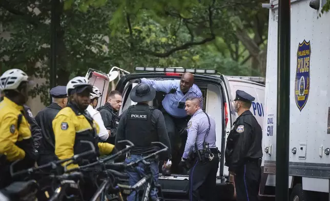 Police gather to clear protesters at the University of Pennsylvania campus, in Philadelphia, on Friday, May 10, 2024. (Jessica Griffin/The Philadelphia Inquirer via AP)
