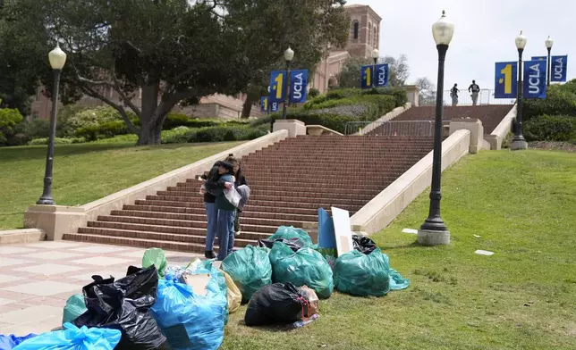 Trash is piled up at the site of a pro-Palestinian encampment which was cleared by police overnight on the UCLA campus, Thursday, May 2, 2024, in Los Angeles. (AP Photo/Ashley Landis)