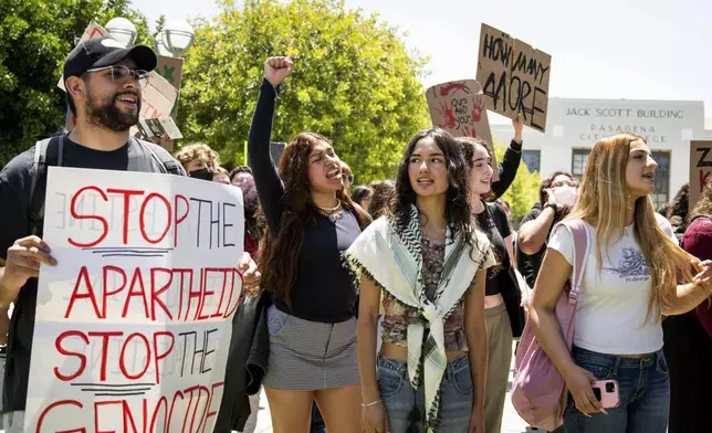 Pro-Palestinian Pasadena City College students walk out of class as they demonstrate against the Israel-Hamas war in Pasadena, Calif., on Tuesday, April 30, 2024. (Sarah Reingewirtz/The Orange County Register via AP)