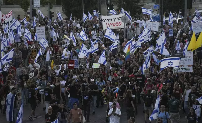 FILE - People protest against Israeli Prime Minister Benjamin Netanyahu's government and call for the release of hostages held in the Gaza Strip by the Hamas militant group, outside the Knesset, Israel's parliament in Jerusalem on May 20, 2024. (AP Photo/Mahmoud Illean, File)