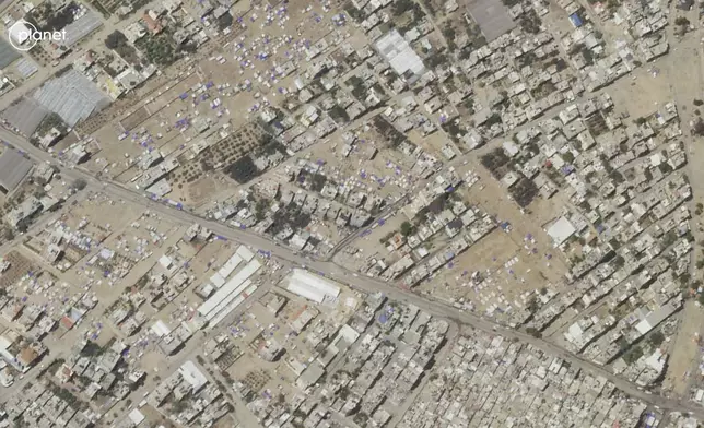 This satellite photo taken by Planet Labs PBC shows an evacuated camp in Rafah, Gaza, May 8, 2024. (Planet Labs PBC via AP)