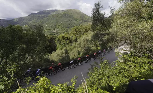 The pack of cyclists rides during the fifth stage of the of the Giro d'Italia, Tour of Italy cycling race, from Genoa to Lucca, Wednesday, May 8, 2024. (Fabio Ferrari/LaPresse via AP)