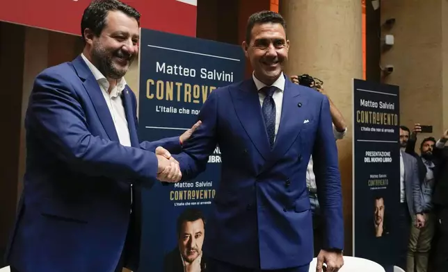 The League leader Matteo Salvini, left, arrives to his book presentation flanked by General Roberto Vannacci, one of the League candidates at the next European Parliament election, in Rome, Tuesday, April 30, 2024. (AP Photo/Alessandra Tarantino)