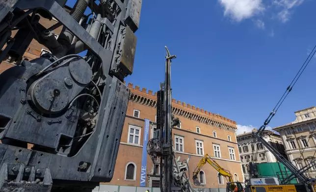 A view of the construction site of the new 25.5-kilometer Metro C subway main hub in Piazza Venezia in central Rome, Thursday, May 23, 2024.During a tour Thursday of the construction site at Piazza Venezia, chief engineer Andrea Sciotti said works on the nearly 3 billion euro project, considered one of the most complicated in the world, were running at pace to be completed by 2034. (AP Photo/Domenico Stinellis)