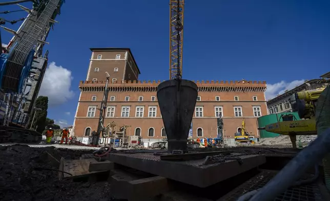 A view of the construction site of the new 25.5-kilometer Metro C subway main hub in Piazza Venezia in central Rome, Thursday, May 23, 2024. During a tour Thursday of the construction site at Piazza Venezia, chief engineer Andrea Sciotti said works on the nearly 3 billion euro project, considered one of the most complicated in the world, were running at pace to be completed by 2034. (AP Photo/Domenico Stinellis)