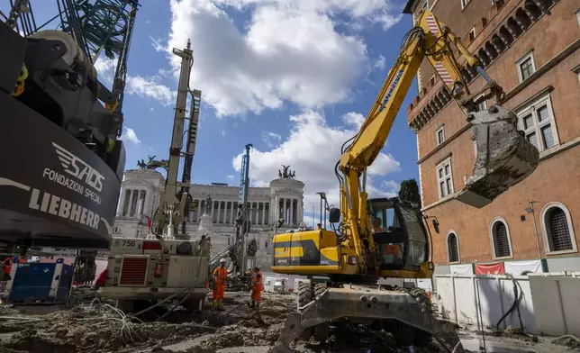 A view of the construction site of the new 25.5-kilometer Metro C subway main hub in Piazza Venezia in central Rome, Thursday, May 23, 2024. During a tour Thursday of the construction site at Piazza Venezia, chief engineer Andrea Sciotti said works on the nearly 3 billion euro project, considered one of the most complicated in the world, were running at pace to be completed by 2034. (AP Photo/Domenico Stinellis)