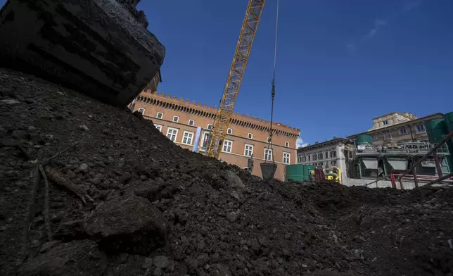 A view of the construction site of the new 25.5-kilometer Metro C subway main hub in Piazza Venezia in central Rome, Thursday, May 23, 2024. During a tour Thursday of the construction site at Piazza Venezia, chief engineer Andrea Sciotti said works on the nearly 3 billion euro project, considered one of the most complicated in the world, were running at pace to be completed by 2034. (AP Photo/Domenico Stinellis)