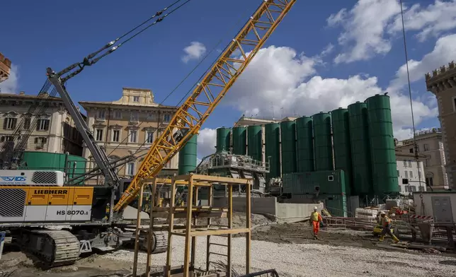 A view of the construction site of the new 25.5-kilometer Metro C subway main hub in Piazza Venezia in central Rome, Thursday, May 23, 2024. During a tour Thursday of the construction site at Piazza Venezia, chief engineer Andrea Sciotti said works on the nearly 3 billion euro project, considered one of the most complicated in the world, were running at pace to be completed by 2034. (AP Photo/Domenico Stinellis)