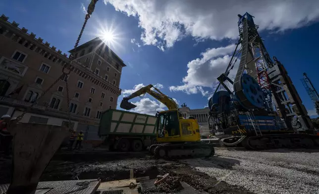 A view of the construction site of the new 25.5-kilometer Metro C subway main hub in Piazza Venezia in central Rome, Thursday, May 23, 2024. During a tour Thursday of the construction site at Piazza Venezia, chief engineer Andrea Sciotti said works on the nearly 3 billion euro project, considered one of the most complicated in the world, were running at pace to be completed by 2034.(AP Photo/Domenico Stinellis)