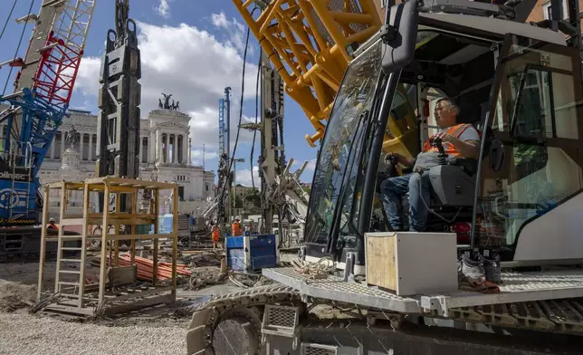 A view of the construction site of the new 25.5-kilometer Metro C subway main hub in Piazza Venezia in central Rome, Thursday, May 23, 2024. During a tour Thursday of the construction site at Piazza Venezia, chief engineer Andrea Sciotti said works on the nearly 3 billion euro project, considered one of the most complicated in the world, were running at pace to be completed by 2034. (AP Photo/Domenico Stinellis)