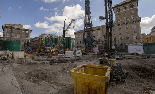 A view of the construction site of the new 25.5-kilometer Metro C subway main hub in Piazza Venezia in central Rome, Thursday, May 23, 2024. During a tour Thursday of the construction site at Piazza Venezia, chief engineer Andrea Sciotti said works on the nearly 3 billion euro project, considered one of the most complicated in the world, were running at pace to be completed by 2034. (AP Photo/Domenico Stinellis)