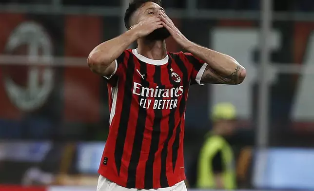 AC Milan's Olivier Giroud celebrates after scoring a goal during the Serie A soccer match against Salernitana at the Giuseppe Meazza Stadium in Milan, Italy, Saturday, May 25, 2024. (Alberto Mariani/LaPresse via AP)