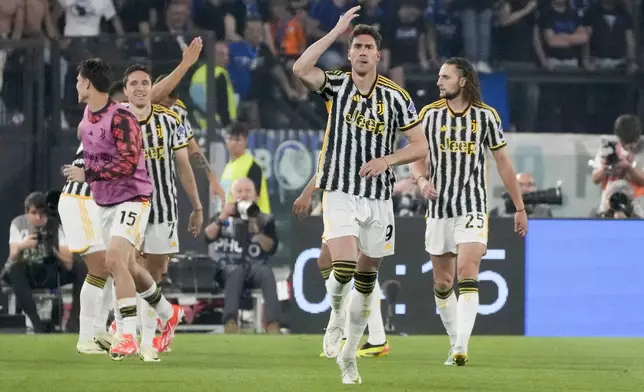 Juventus' Dusan Vlahovic celebrates after scoring the opening goal during the Italian Cup final soccer match between Atalanta and Juventus at Rome's Olympic Stadium, Italy, Wednesday, May 15, 2024. (AP Photo/Gregorio Borgia)