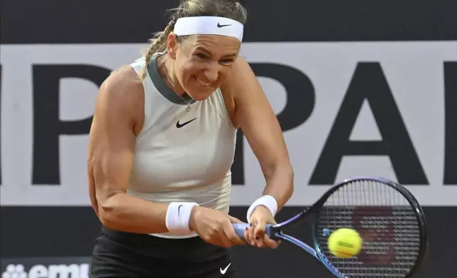 Victoria Azarenka in action during her match against Danielle Collins of the US at the Italian Open tennis tournament at Rome's Foro Italico, Wednesday, May 15, 2024. (AP Photo/Antonietta Baldassarre)