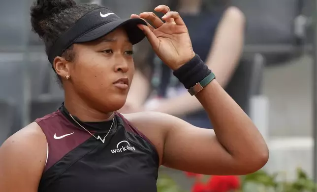 Japan's Naomi Osaka waits to receive the ball during her match against France's Clara Borel at the Italian Open tennis tournament in Rome, Wednesday, May 8, 2024.(AP Photo/Gregorio Borgia)