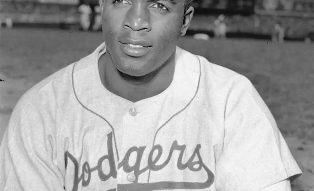 FILE - Brooklyn Dodgers' infielder Jackie Robinson is photographed on April 18, 1948. Metalsmiths in Colorado are remaking Robinson in bronze after the theft of a beloved Kansas statue of the civil rights baseball icon set off an outpouring of donations. (AP Photo, File)