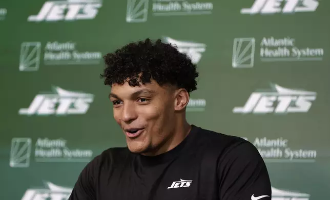 New York Jets' Braelon Allen speaks to the media after an NFL rookie minicamp football practice Friday, May 3, 2024, in Florham Park, N.J. (AP Photo/Adam Hunger)