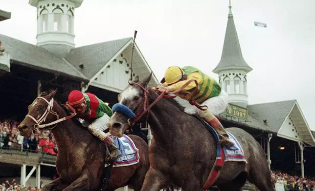 Silver Charm, right, with Jockey Gary Stevens aboard, noses out Captain Bodgit to win the 123rd Kentucky Derby horse race, Saturday, May 3, 1997 in Louisville, Ky. Now the oldest living Derby winner, Silver Charm has lived in leisure at Old Friends, a retirement home for thoroughbreds in Kentucky's scenic bluegrass region, for nearly a decade. (AP Photo/Al Behrman, File)