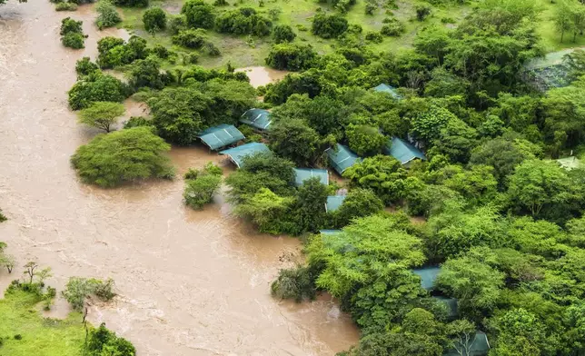 A lodge is seen in the flooded Maasai Mara National Reserve, which left dozens of tourists stranded in Narok County, Kenya, Wednesday, May 1, 2024. Kenya, along with other parts of East Africa, has been overwhelmed by flooding. (AP Photo/Bobby Neptune)