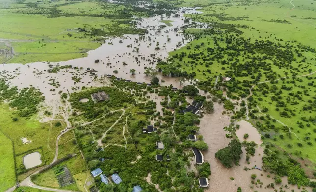 Aerial view of flooded Maasai Mara National Reserve, that left dozens of tourists stranded in Narok County, Kenya, Wednesday, May 1, 2024. Kenya, along with other parts of East Africa, has been overwhelmed by flooding. (AP Photo/Bobby Neptune)