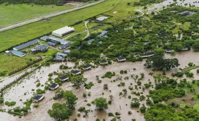 Aerial view of flooded Maasai Mara National Reserve, that left dozens of tourists stranded in Narok County, Kenya, Wednesday, May 1, 2024. Kenya, along with other parts of East Africa, has been overwhelmed by flooding. (AP Photo/Bobby Neptune)