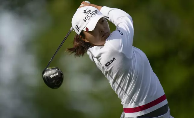 Jin Young Ko, of South Korea, hits off the 13th tee during the first round of the LPGA Cognizant Founders Cup golf tournament, Thursday, May 9, 2024, in Clifton, N.J. (AP Photo/Seth Wenig)